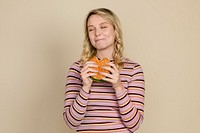 Happy woman eating a hamburger for lunch