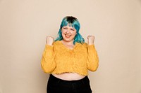 Blue hair woman celebrating her success 