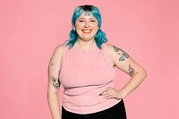 Confident & curvy woman on pink background