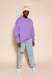 Black man in trendy purple outfit