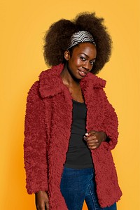 Woman wearing red teddy coat