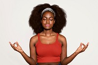 Black yoga woman meditating, off white background