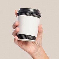 Coffee cup sleeve mockup psd held by woman&#39;s hand