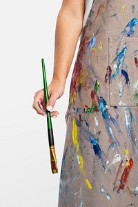 Female artist mockup psd holding a paintbrush