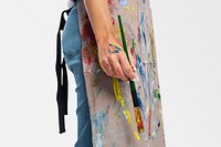 Female artist mockup psd holding a paintbrush