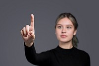 Woman gesture mockup psd pressing on an invisible screen