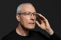 Senior man using smart glasses