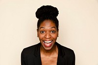 African-American woman smiling on beige background