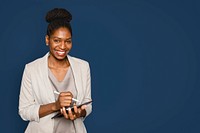 Smiling woman writing notes on tablet digital device