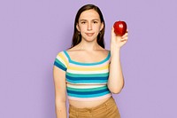 Woman holding apple mockup psd for healthy eating campaign
