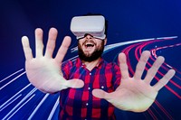 Bearded man having fun with VR headset digital remix