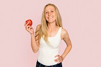 Woman holding apple mockup psd for healthy eating campaign