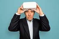 Senior man having wearing VR headset digital device