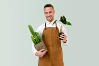 Small business owner holding potted plants