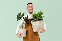 Plant shop owner mockup psd holding houseplants