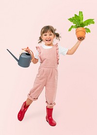 Happy girl mockup psd with potted bird's nest fern