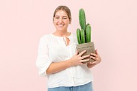 Happy plant lady mockup psd holding potted cereus cactus