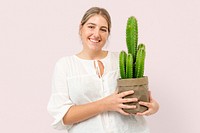 Happy plant lady mockup psd holding potted cereus cactus
