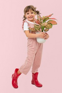 Happy girl mockup psd with potted aglaonema pink lady