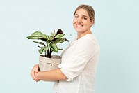 Happy plant lady mockup psd holding potted calathea