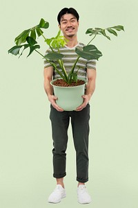 Asian plant lover mockup psd holding potted monstera