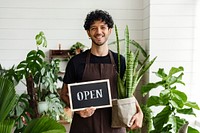 Blackboard sign mockup psd with plant shop owner