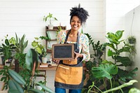 Small business owner holding a blank sign 