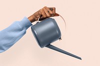 Hand mockup psd holding gray watering can gardening tool