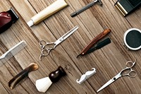 Wooden background barber tools pattern psd, job and career concept