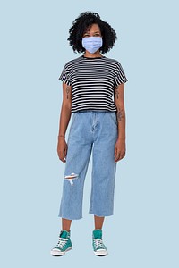 African woman wearing face mask in the new normal full body
