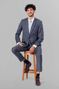 Confident businessman sitting mockup psd on a wooden stool jobs and career campaign