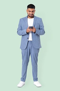 Businessman texting on the phone