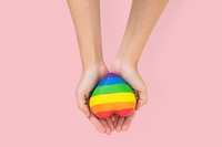 LGBTQ+ community heart mockup psd with hands presenting