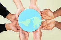 Hands holding earth save the environment campaign