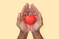 Hands cupping heart mockup psd in love and relationship concept