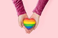 LGBTQ+ community heart mockup psd with hands presenting