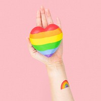 LGBTQ+ community heart mockup psd with hands presenting