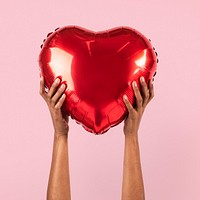 Valentines heart balloon mockup psd held by a person