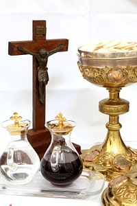 Crucifix, holy water and chalice. Original public domain image from Wikimedia Commons