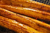 Grilled eels. Original public domain image from Wikimedia Commons