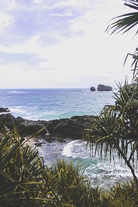 I took this picture at the Timang Beach and Siung Beach, Yogyakarta. Especially Siung Beach, is by far the best beach I've visited. Original public domain image from Wikimedia Commons