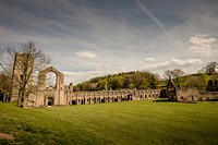 Here is a photograph taken from Fountains Abbey. Located in Ripon, Yorkshire, England, UK. Original public domain image from Wikimedia Commons