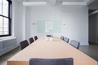 A conference room with table and chairs. Original public domain image from <a href="https://commons.wikimedia.org/wiki/File:Chairs-2181923.jpg" target="_blank" rel="noopener noreferrer nofollow">Wikimedia Commons</a>