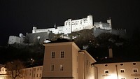 Salzburg Castle at Night. Original public domain image from <a href="https://commons.wikimedia.org/wiki/File:Salzburg_Castle_At_Night_(211677191).jpeg" target="_blank">Wikimedia Commons</a>