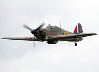 Hurricane Mk1, RAF serial R4118, Squadron code UP-W, UK civil registration G-HUPW, at the PFA Flying for Fun Rally at Kemble Airfield, Gloucestershire, England.The aircraft was delivered new to 605 (County of Warwick) Squadron at Drem, Scotland, on August 17th 1940.This aircraft flew 49 combat sorties from Croydon, England, destroying 3 enemy aircraft and damaging 2 others.