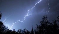 Lightning in the night. Original public domain image from Wikimedia Commons