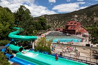 The world&#39;s largest hot springs pool was attraction enough for a century at the Glenwood Hot Springs in Glenwood Springs, Colorado, but all sorts of slides and chutes and water courses were then added to diversity visitors&#39; enjoyment.