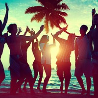 A group of diverse people is having fun at the beach