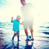 Father Son Playing Soccer Beach Summer Concept