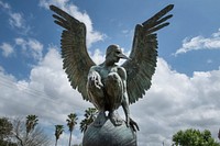 A statue by Mexican artist Jorge Mar&iacute;n, part of his &quot;Wings of the City&quot; exhibit outside the Brownsville, Texas, Museum of Fine Art. Original image from <a href="https://www.rawpixel.com/search/carol%20m.%20highsmith?sort=curated&amp;page=1">Carol M. Highsmith</a>&rsquo;s America, Library of Congress collection. Digitally enhanced by rawpixel.